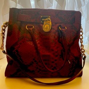 Beautiful faux snakeskin red Michael Kors tote bag